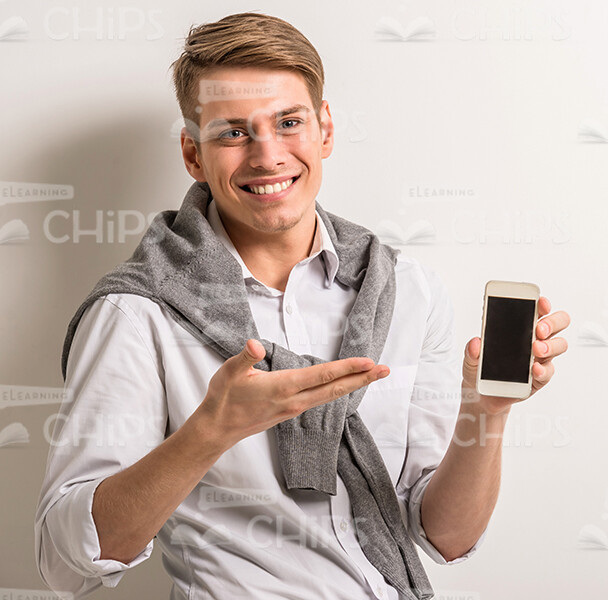 Happy Male Character Presenting Mobile Phone Stock Photo Happy Male Character Presenting Mobile Phone Stock Photo