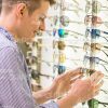 Young Man Looking For New Glasses Stock Photo