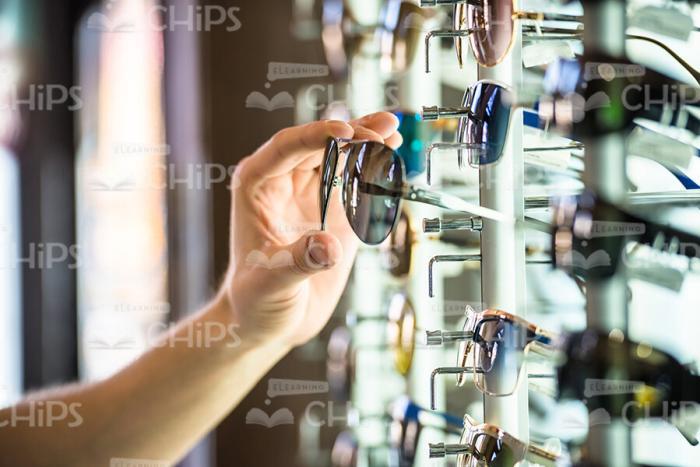 Close Up Stock Photo Of Man's Hand Holds Glasses