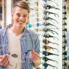 Excited Man Buying Glasses Stock Photo