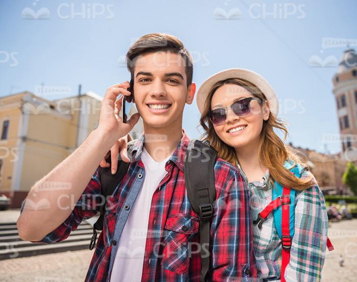 Young Tourist Talking On Mobile Phone Stock Photo