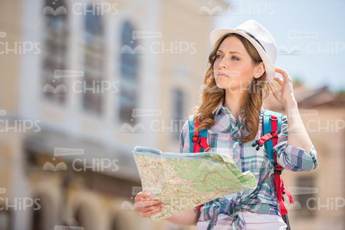 Young Girl Travels Around The City Stock Photo