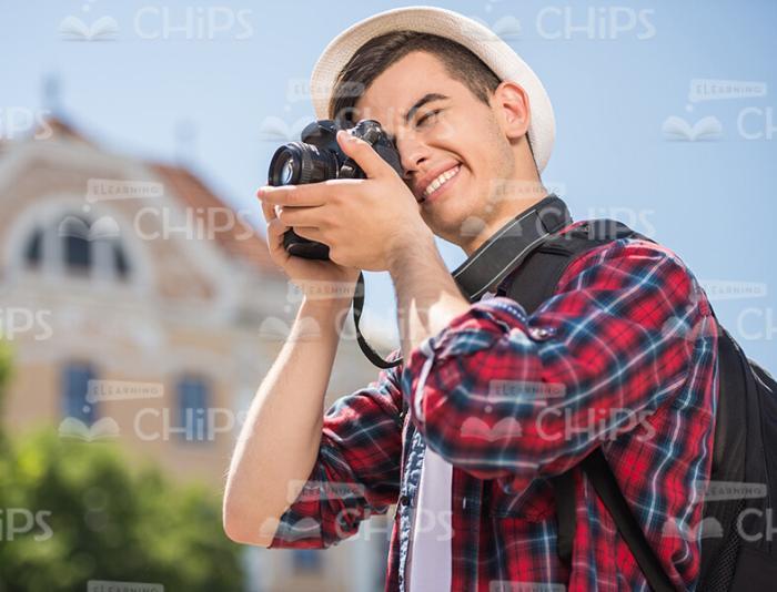 Teenage Traveler Using Camera To Take Picture Stock Photo
