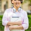 Young Asian Student Holding Tablet Stock Photo