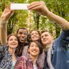 Smiling Young People Take Selfie Stock Photo