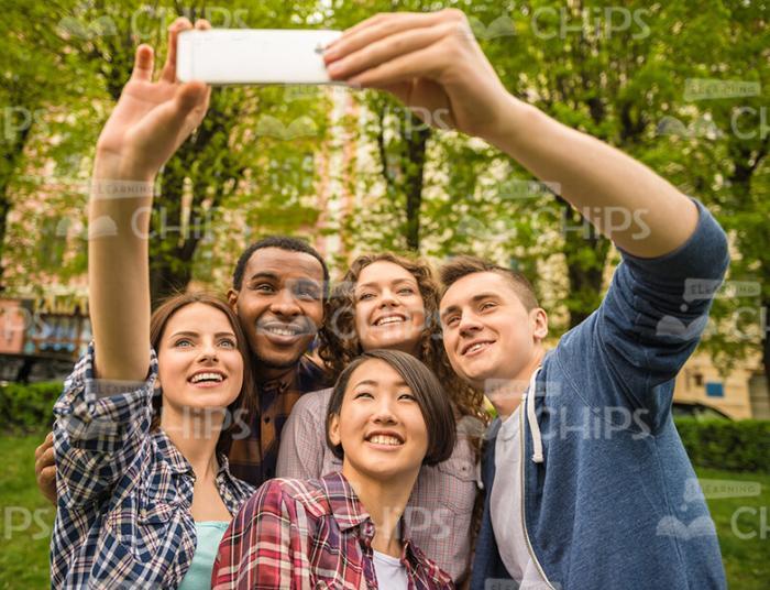 Smiling Young People Take Selfie Stock Photo