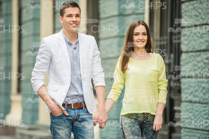 Young Couple Walking Together Stock Photo