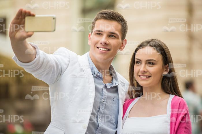 Young Couple Taking Selfie Stock Photo