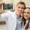 Smiling Couple Making Selfie Stock Photo