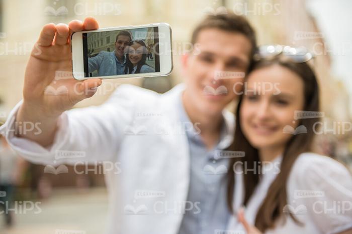 Smiling Couple Making Selfie Stock Photo