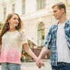 Stock Photo Of Young Couple Walking And Holding Hands