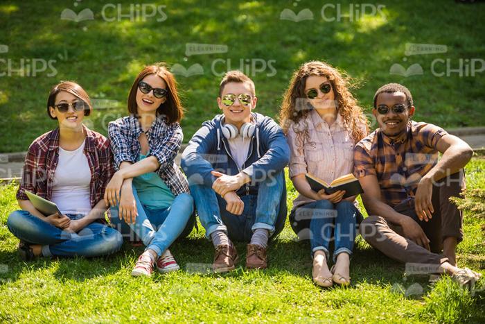 Handsome Students Studying Outdoors Stock Photo