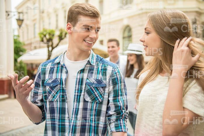 Young Man And Nice Woman Looking On Each Other Stock Photo