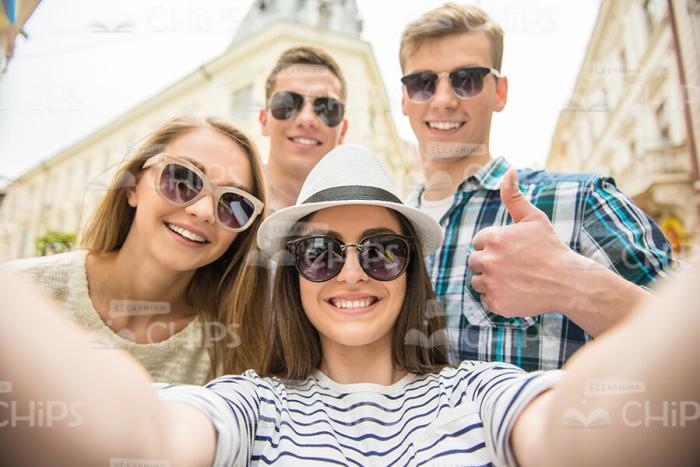 Smiling Young People Having Fun Together Stock Photo