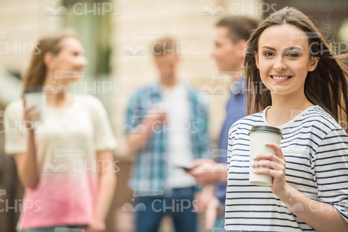 Young Girl With Paper Coffee Cup Stock Photo