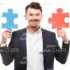 Male Character Holding Two Puzzle Pieces Stock Photo