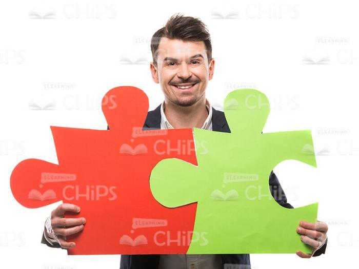 Smiling Man Connected Puzzles Stock Photo