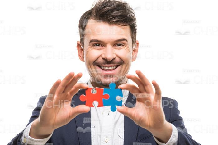 Happy Man Connected Puzzles Stock Photo On White Background