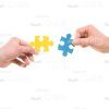 Hands With Puzzle Pieces Stock Photo White Background