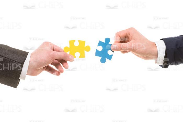 Hands With Puzzle Pieces Stock Photo White Background