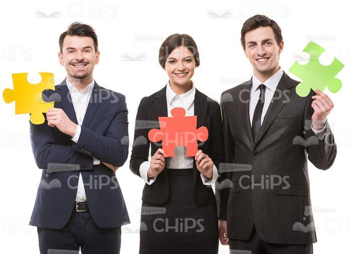 Confident Business People Holding Puzzles Stock Photo Isolated On White