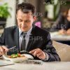Businessman Having Lunch Time Stock Photo