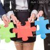 Business Character's Hands With Pieces Of Jigsaw Stock Photo
