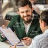 Smiling Man Holding Clipboard Stock Photo
