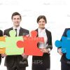 Putting Puzzles Together Stock Photo