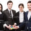 Four People And Small Pieces Of Puzzle Stock Photo