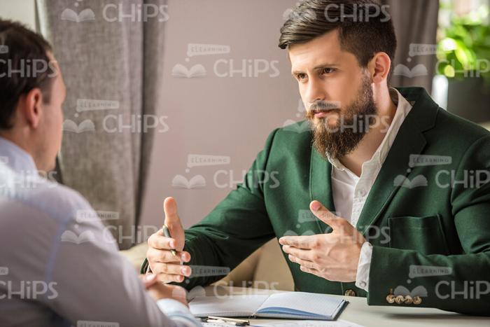 Serious Business Conversation Between Two Characters Stock Photo