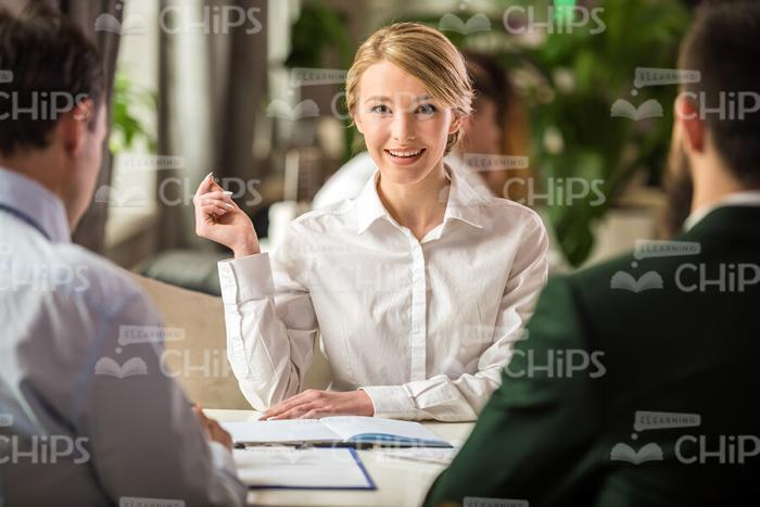 Businesswoman At Meeting Stock Photo