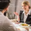 Business Woman Talking During Lunch Stock Photo