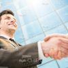 Young Businessman Greets His Partner Stock Photo