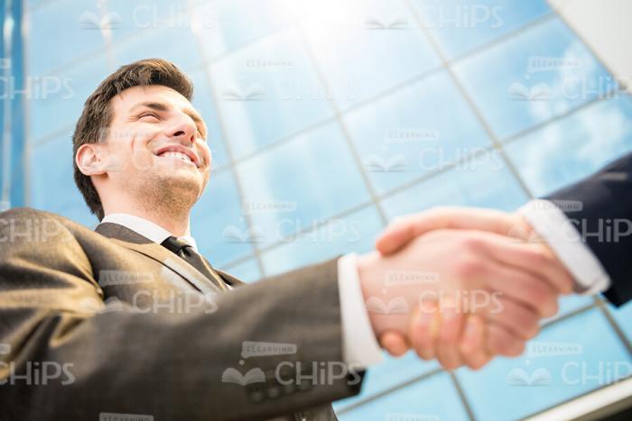 Young Businessman Greets His Partner Stock Photo