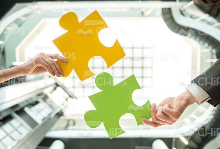 Stock Photo Of Hands Holding Puzzle Pieces