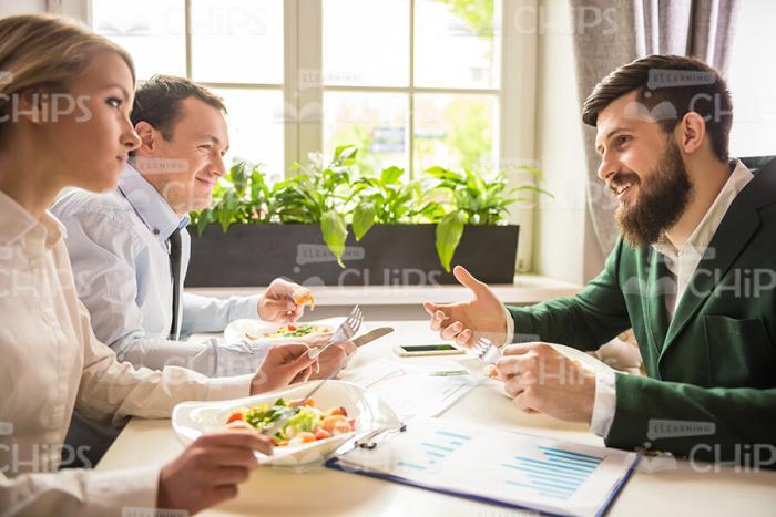 Business Meeting At Restaurant Stock Photo