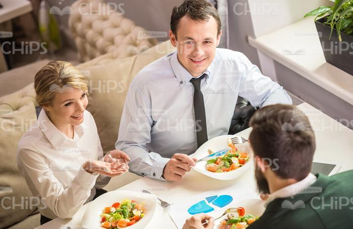 Nice Business People Having Lunch Time At Restaurant Stock Photo