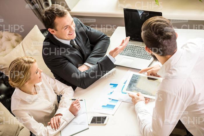 Handsome People Talking About Businesses Stock Photo