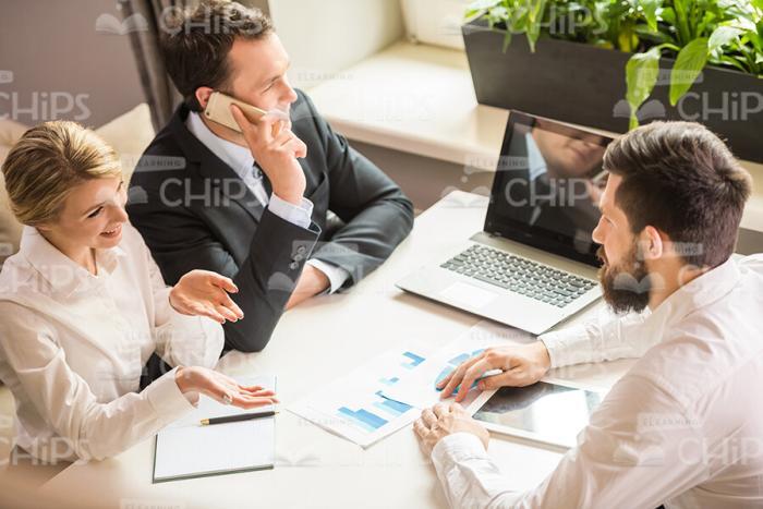 Partners Discussing Common Businesses Stock Photo