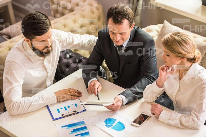 Business People Using Tablet Stock Photo