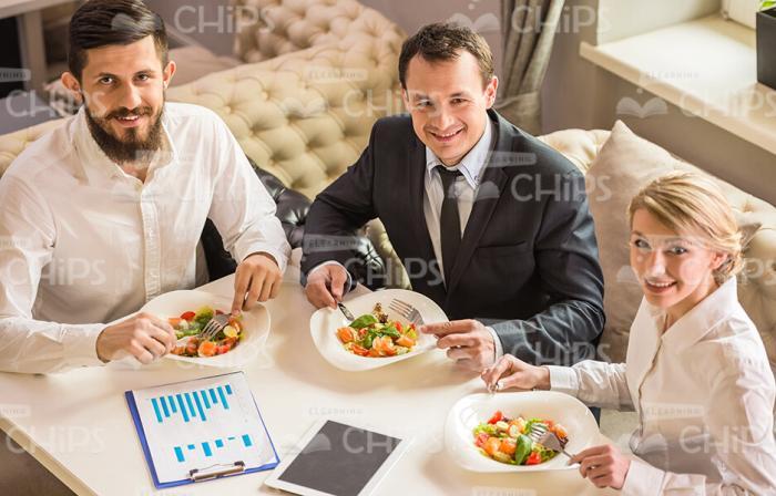 Three Handsome Business Persons Stock Photo