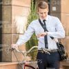 Young Business Man Walking And Looking On Watch Stock Photo