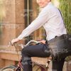 Smiling Man Riding The Bicycle Stock Photo