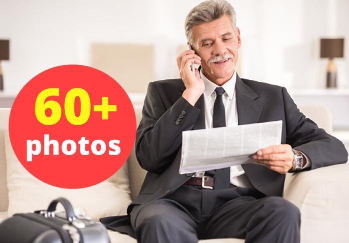 Mid-Aged Businessman In Hotel Room Stock Photo Pack-0