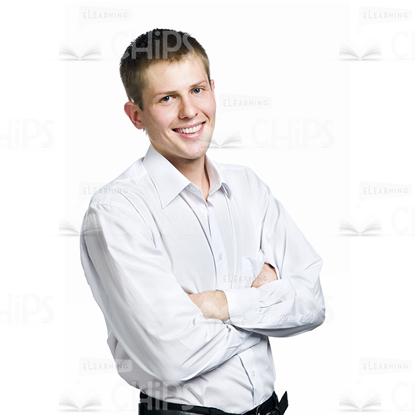 Half-Turned Smiling Young Man Crossed Hands Stock Photo