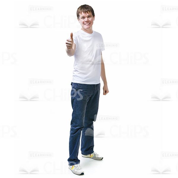 Smiling Young Man Showing Thumb Up Gesture Stock Photo