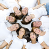 Smiling People Lying Head To Head Stock Photo