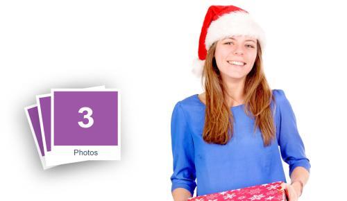 Young Woman Opening Christmas Present Stock Photo Pack-0