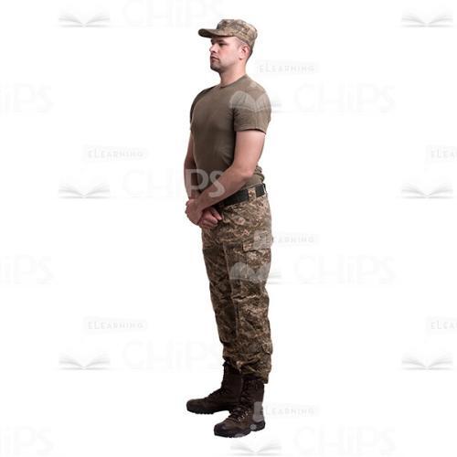 Sideway Standing Young Soldier With The Crossed Hands Cutout Photo-0